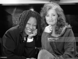 American actor and comedian Whoopi Goldberg and American blues singer, guitarist, songwriter, and activist Bonnie Raitt pose for a portrait circa 1990 in Los Angeles, California.