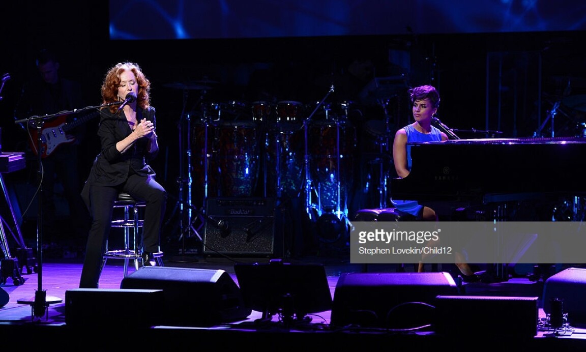 Bonnie Raitt and Alicia Keys performing "I Can't Make You Love Me" on stage during Black Ball Redux at The Apollo Theater on December 6, 2012 in New York City.