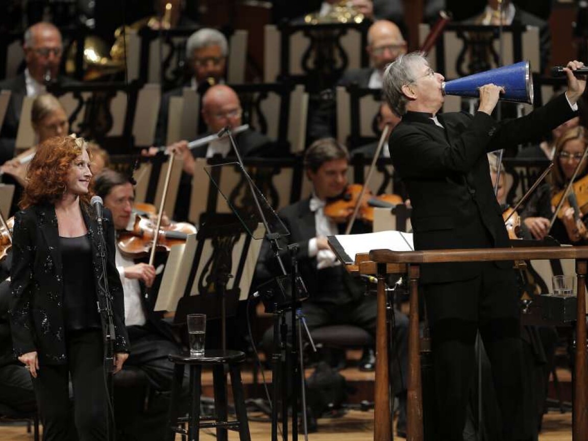 Special guest Bonnie Raitt helps Michael Tilson Thomas celebrate his milestone as music director of the San Francisco Symphony. Raitt sang three classic American theatrical songs, including one her father, John Raitt, had sung at Davies Symphony Hall in San Francisco on Wednesday, Sept. 3, 2014.