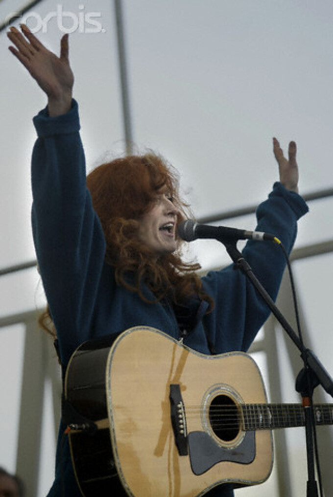 Singer Bonnie Raitt performs for the peace marchers at the park opposite City Hall during a protest against the possible American invasion of Iraq. - San Francisco, California, USA - 16 Feb 2003