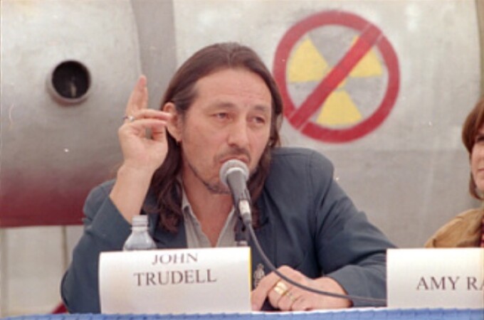 Native American poet and performing artist John Trudell makes a statement at a press conference on the west terrace of the Capitol in opposition to H.R. 1270, the Nuclear Waste Policy Act of 1997, which would allow for the transfer of radioactive waste to Yucca Mountain, Nevada. Nevada Democratic Sens. Harry Reid and Richard Bryan also attended. 24 Sept. 1997