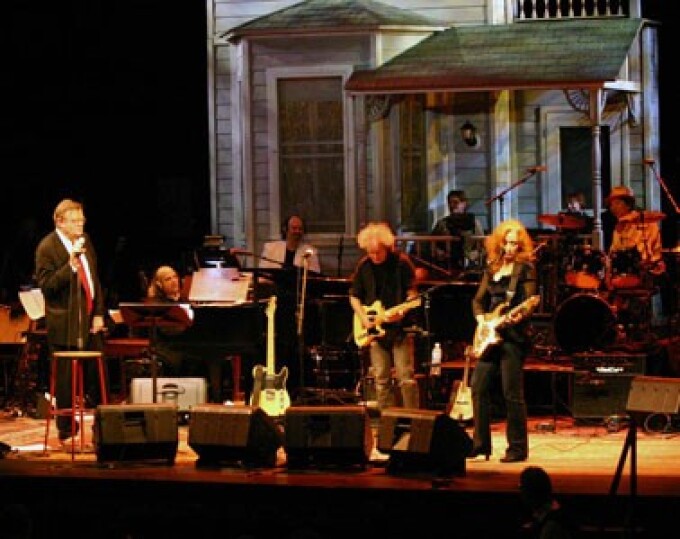 All eyes on the commanding Bonnie Raitt. A Prairie Home Companion with Garrison Keillor - Fitzgerald Theater, St. Paul, MN - October 28, 2006
