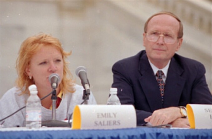 Emily Saliers of the music group Indigo Girls and Sen. Richard Bryan, D-Nev., at a press conference on the west terrace of the Capitol in opposition to H.R. 1270, the Nuclear Waste Policy Act of 1997, which would allow for the transfer of radioactive waste to Yucca Mountain, Nevada. Nevada Democratic Sen. Harry Reid also attended. 24 Sept. 1997
